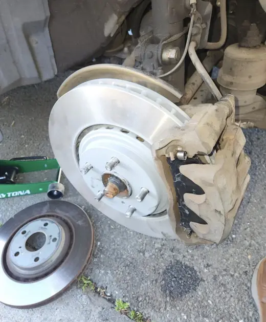 New rotor installed, worn one on the ground